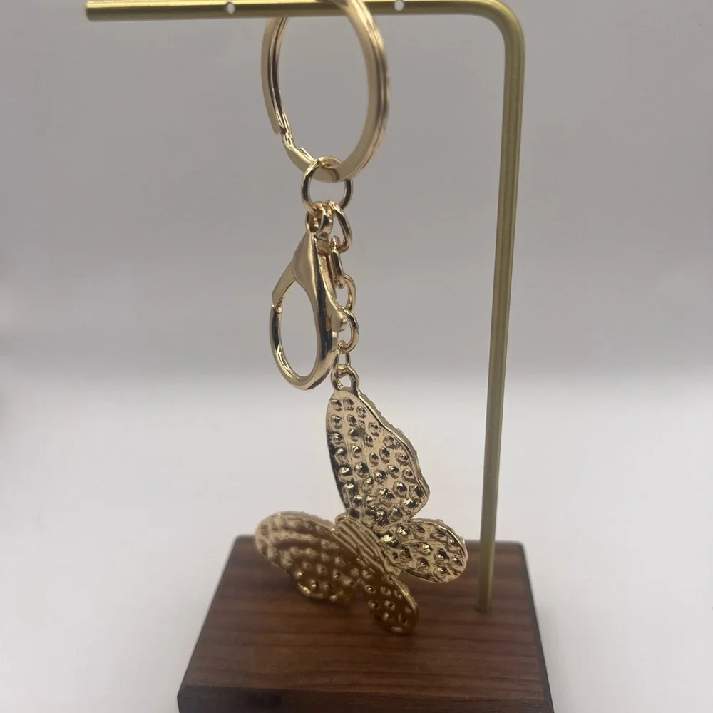 Brand New Gold Butterfly Keychain Faux Pearls and lots of Sparkle